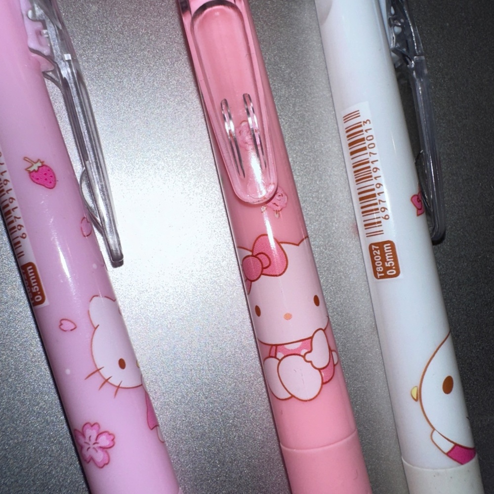 Hello Kitty Pen set. 4 pieces Pink and white Hello Kitty pens.